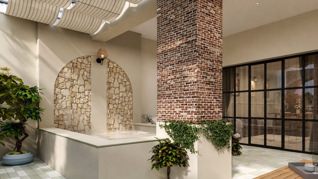 Patio contemporain avec arches, pierre, brique et verrière